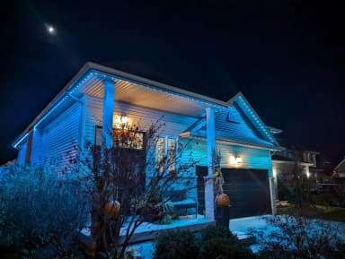 100 ft permanent lighting kit installed on a home