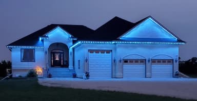 50 ft permanent lighting kit installed on a home