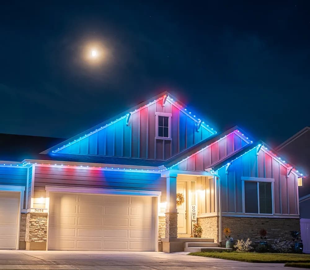 Home fitted with discreet aluminum-tracked LED soffit lighting