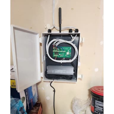 WLED controller board mounted in an enclosure